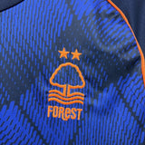 Camisola NOT-FOR 2025-26 Alternativa Azul Versão Adepto
