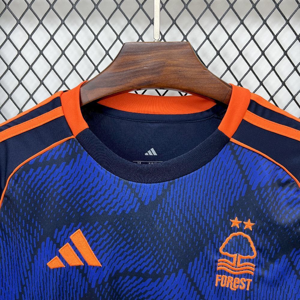 Camisola NOT-FOR 2025-26 Alternativa Azul Versão Adepto
