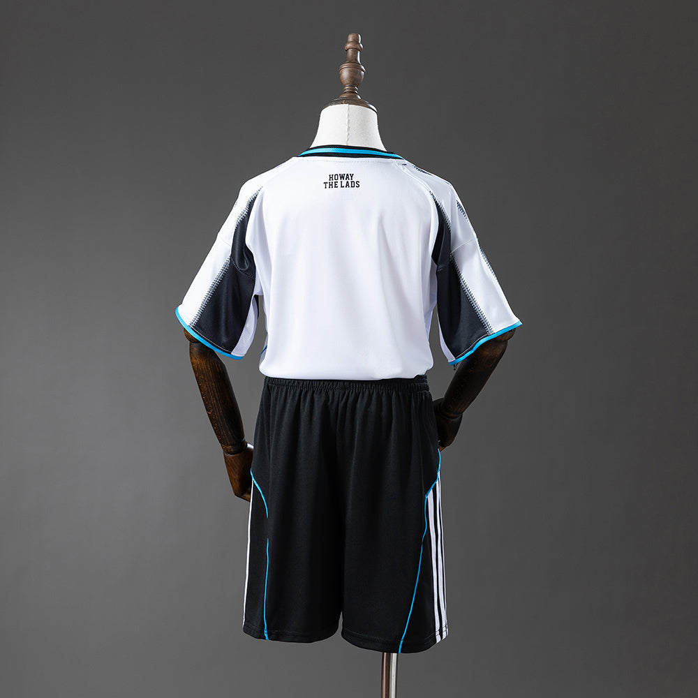 Kit Criança NCU 2025-26 Principal