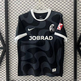 Camisola SC Freiburg 2025-26 Alternativa Preta Versão Adepto