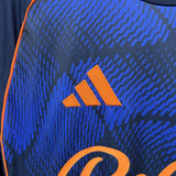 Camisola NOT-FOR 2025-26 Alternativa Azul Versão Adepto