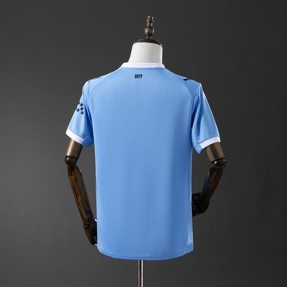 Camisola Manchester City Principal 2025/26