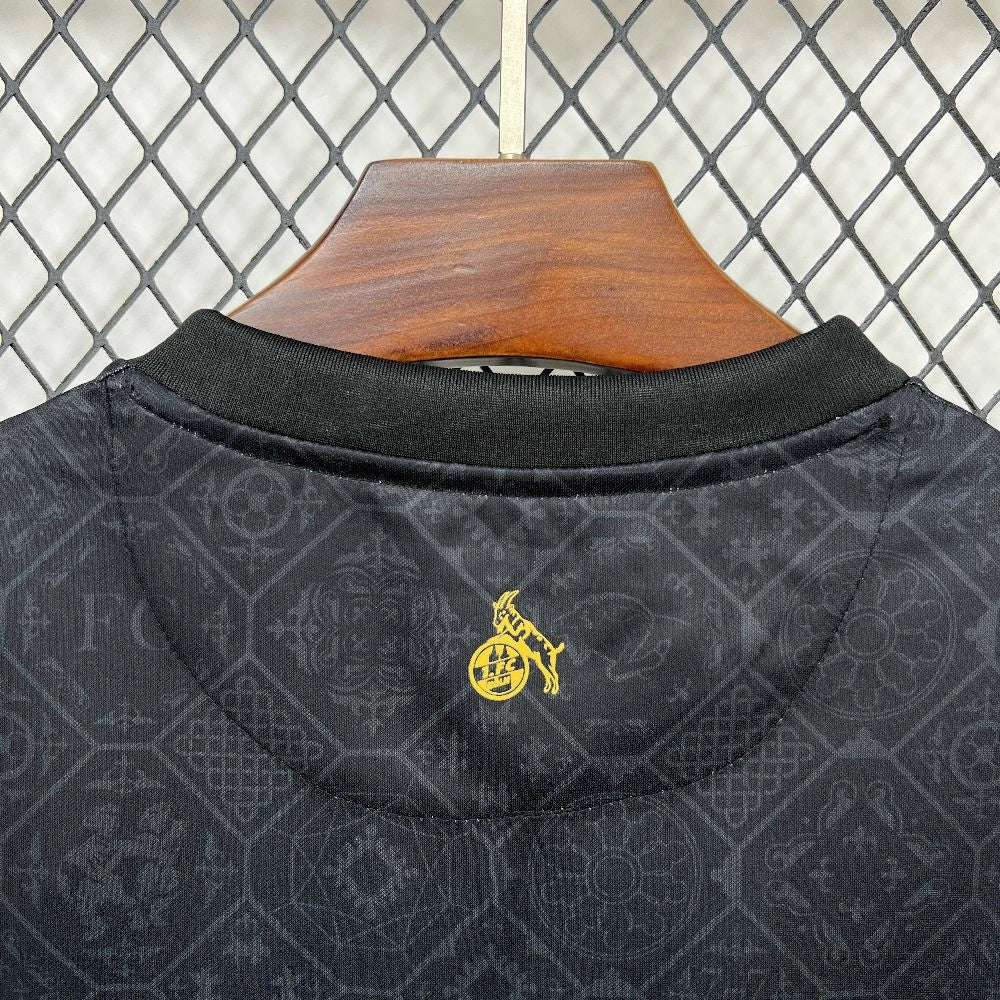 Camisola 1.FC Koln 2025-26 Alternativa Preta Versão Adepto